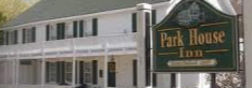 green sign in front of park house bed and breakfast